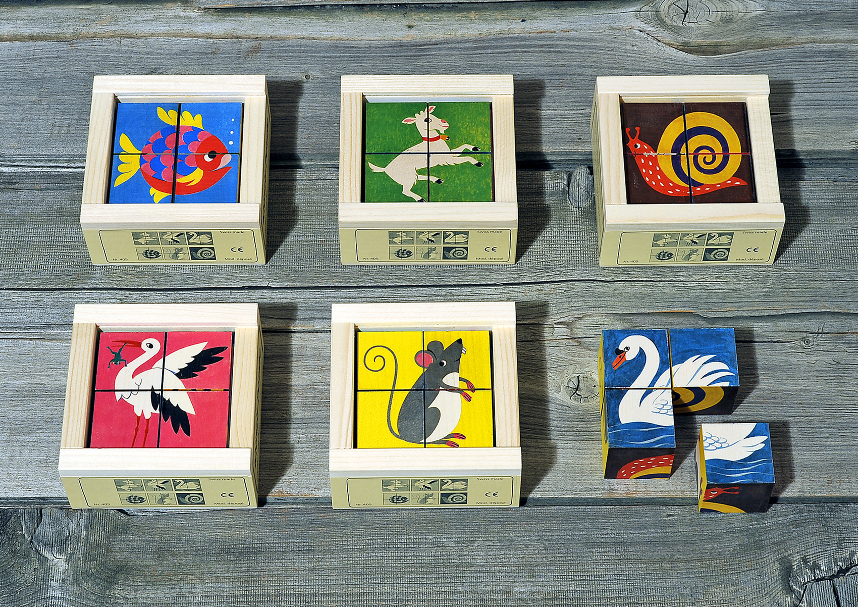 Artikel-405_Wurfelpuzzle_Haustiere Klötzlipuzzle 4-teilig, Haustiere mit Farbhintergrund
